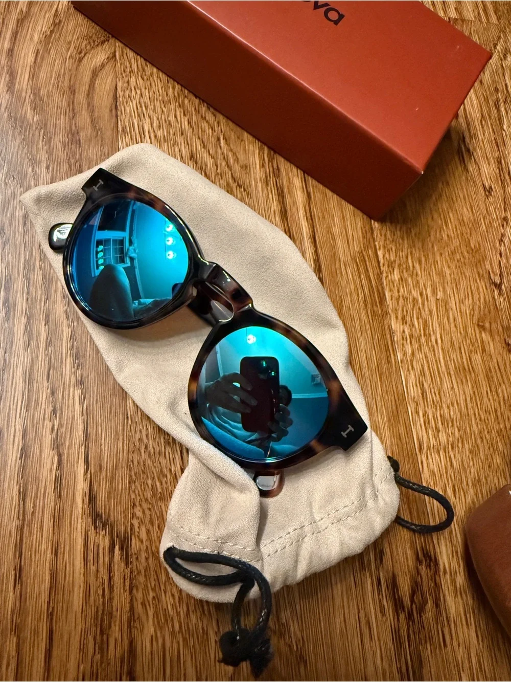 Illesteva Tortoiseshell Frame Sunglasses with Blue Mirrored Lenses